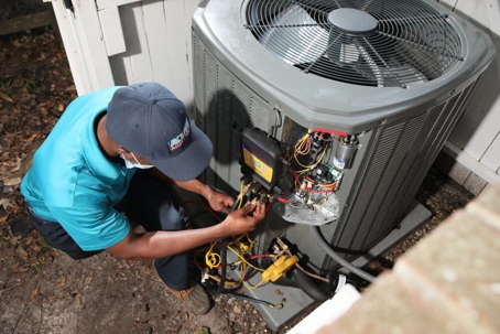 Technician Fixing Air Conditioner